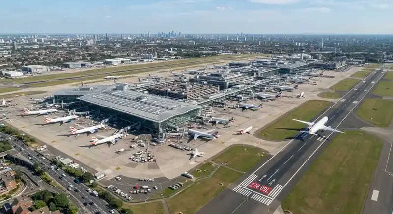 Private hire car collecting passengers outside Heathrow Terminal 5